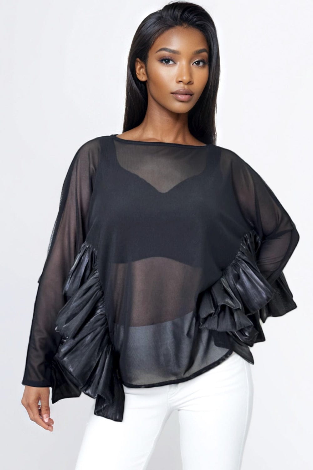 Blusa negra transparente con mangas largas